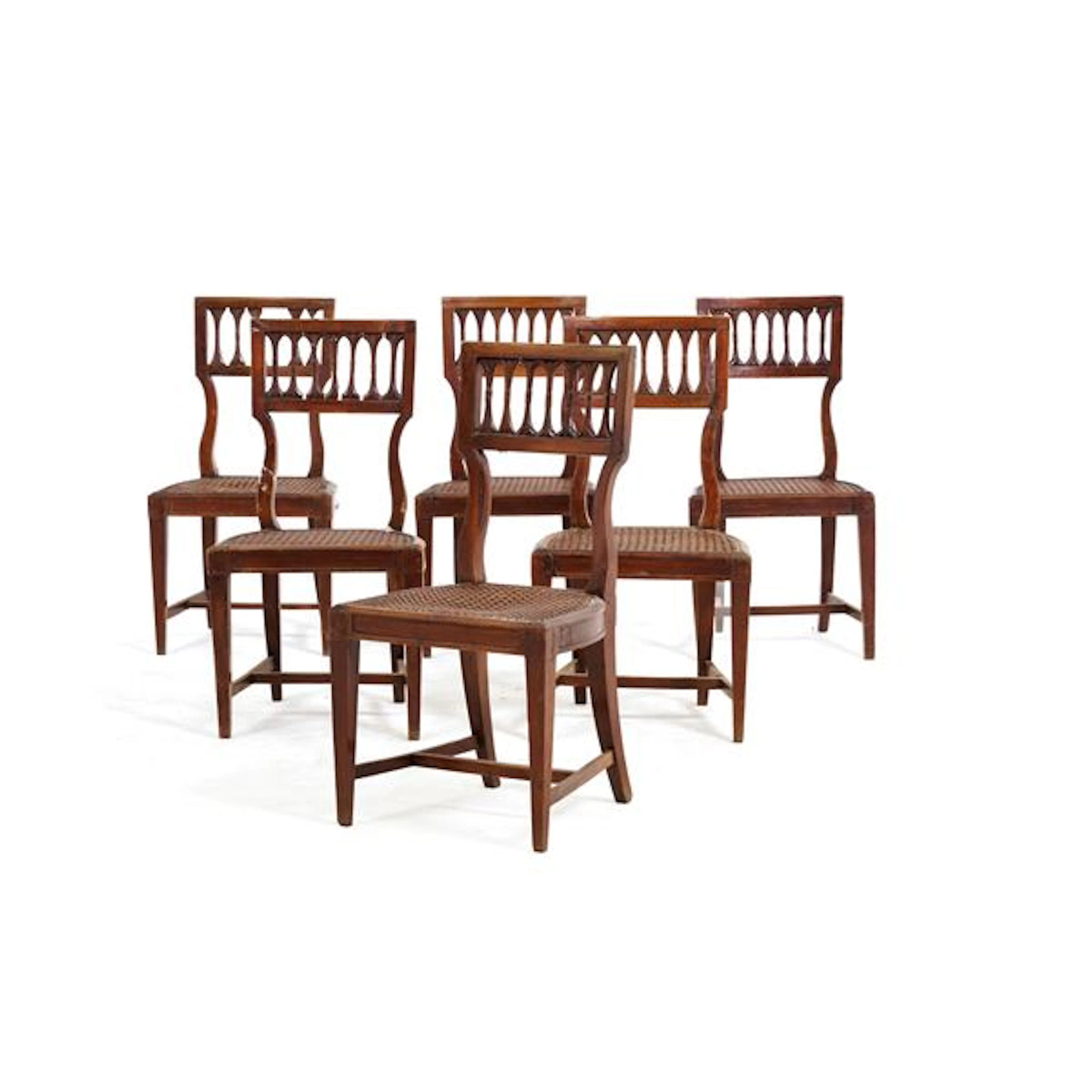 Gruppo di sei sedie in legno intagliato. XIX secolo