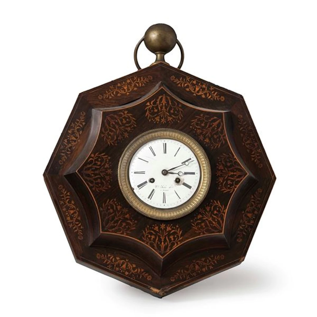 Orologio da parete in legno intarsiato