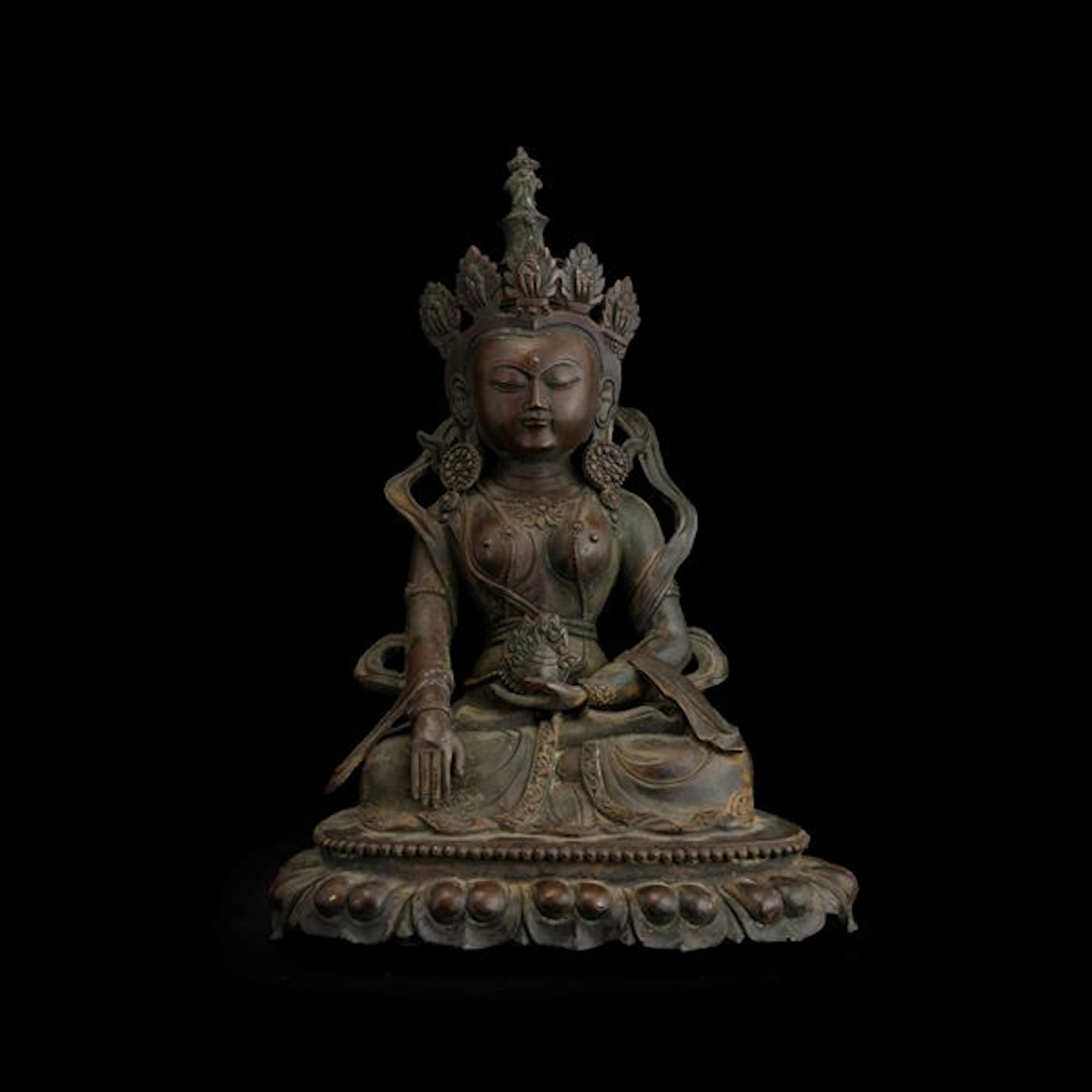Bronze figure of Guanyin seated on a lotus flower, China, Ming Dynasty