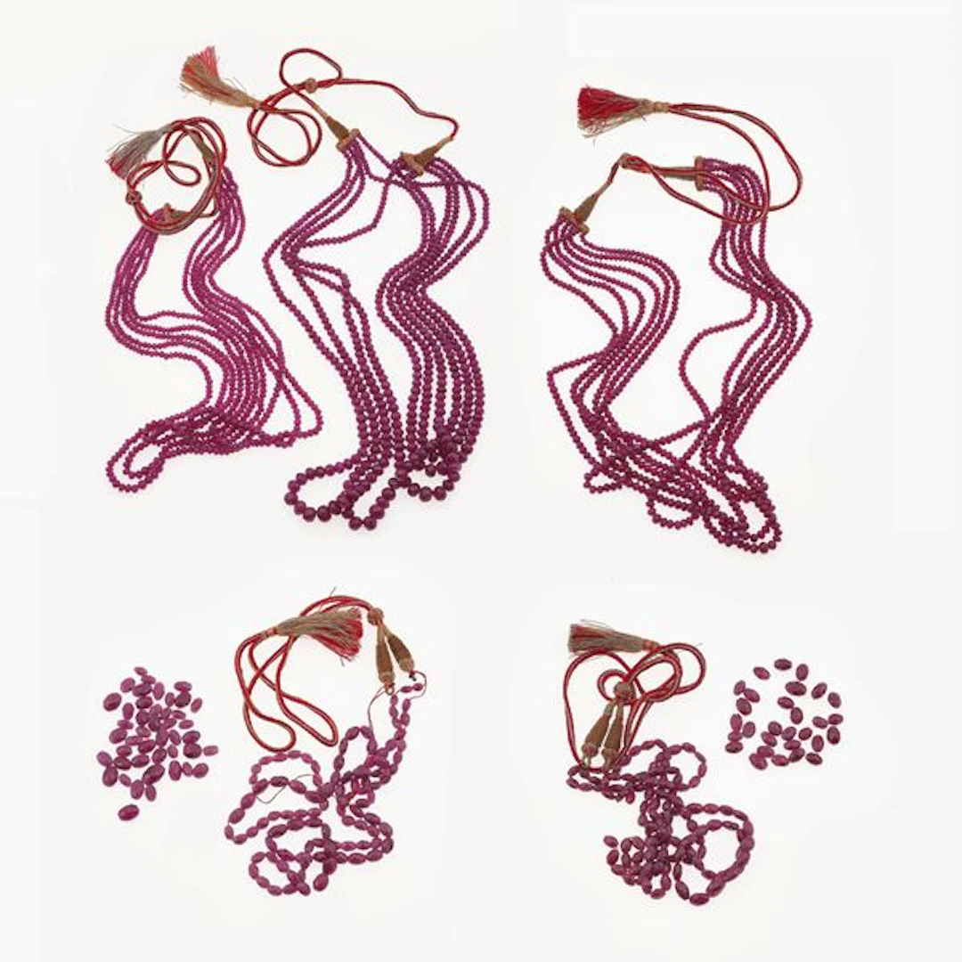 Filve multi-strand ruby necklaces. Two damaged necklaces