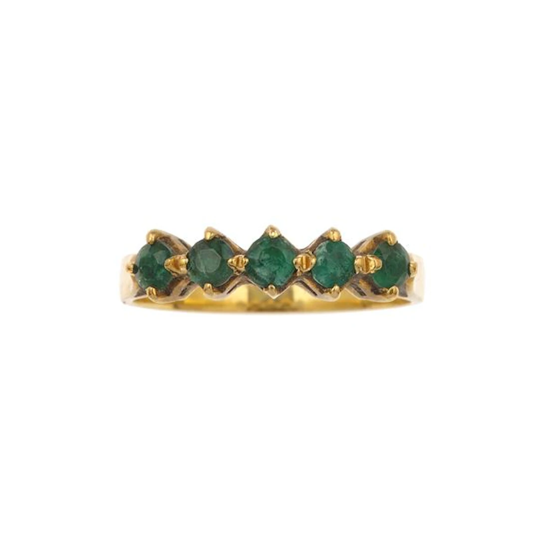 Emerald and gold ring