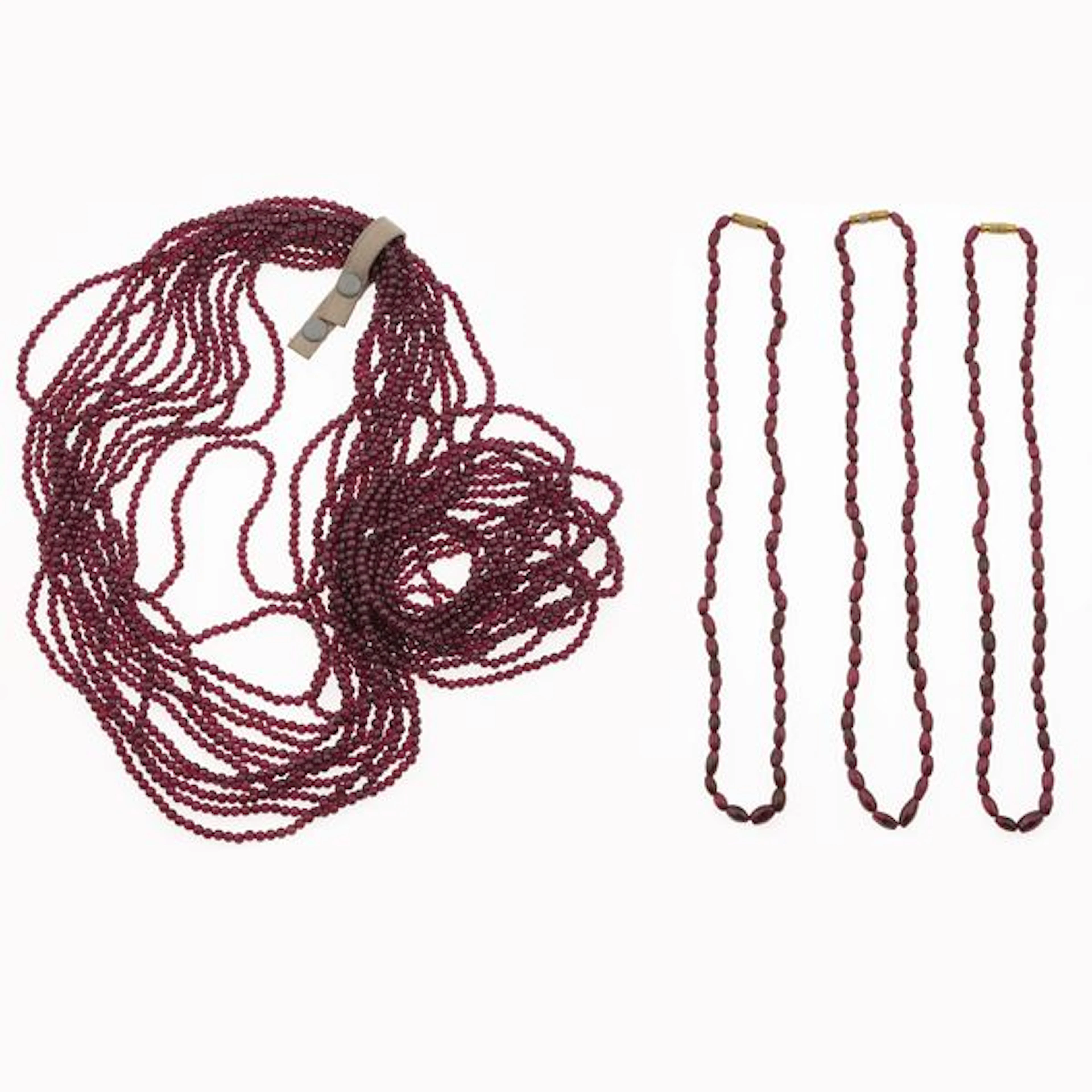Thirteen strand of garnet and three necklace