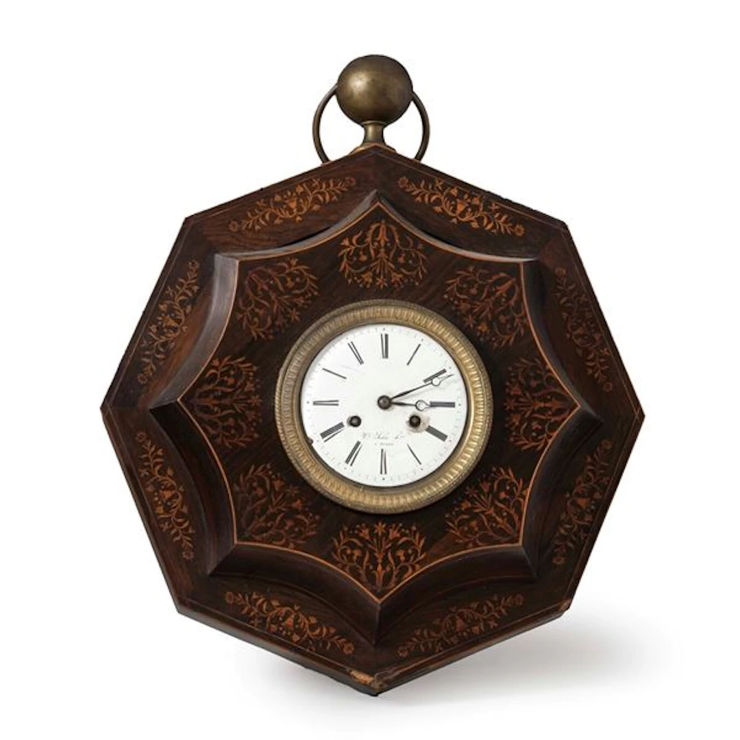 Orologio da parete in legno intarsiato