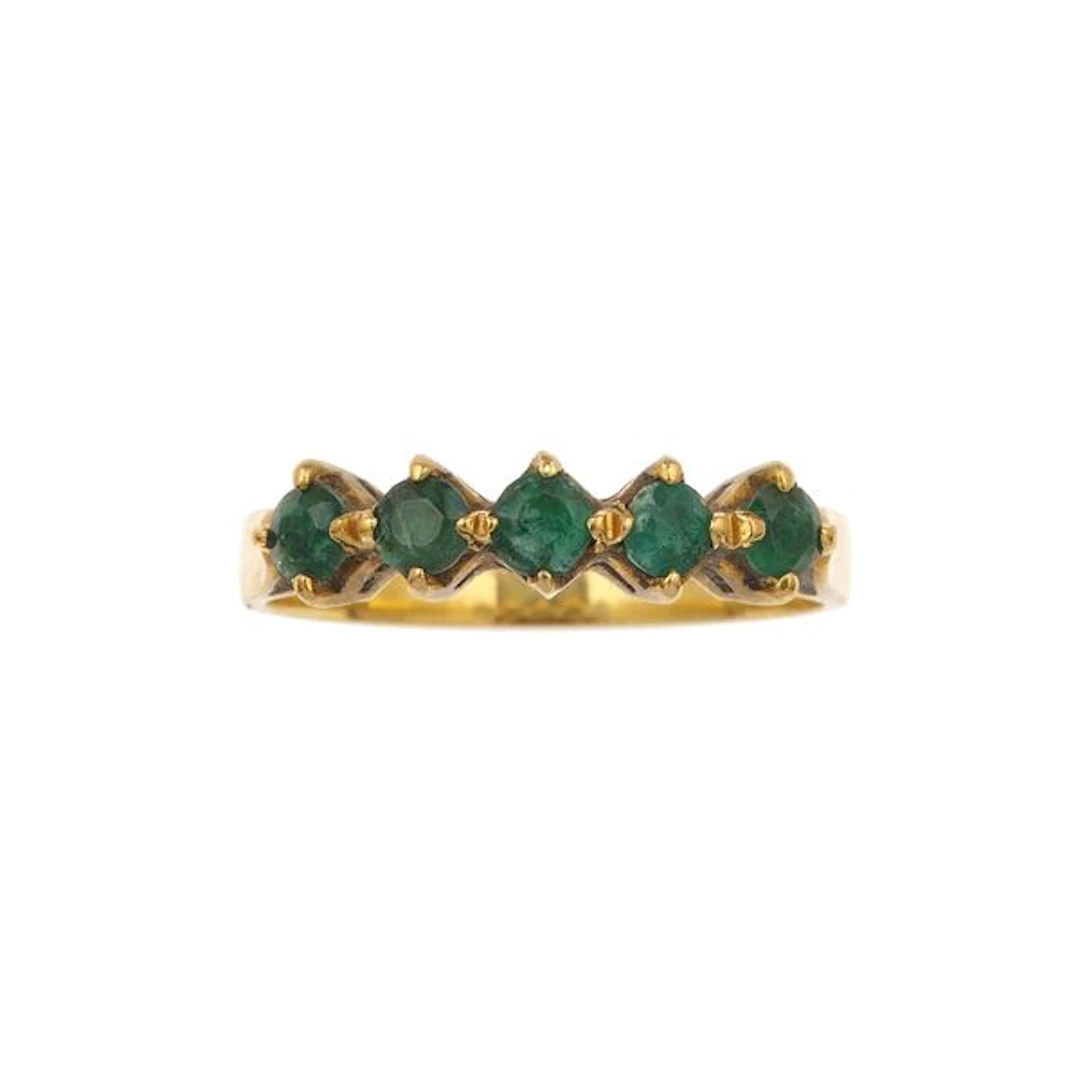 Emerald and gold ring