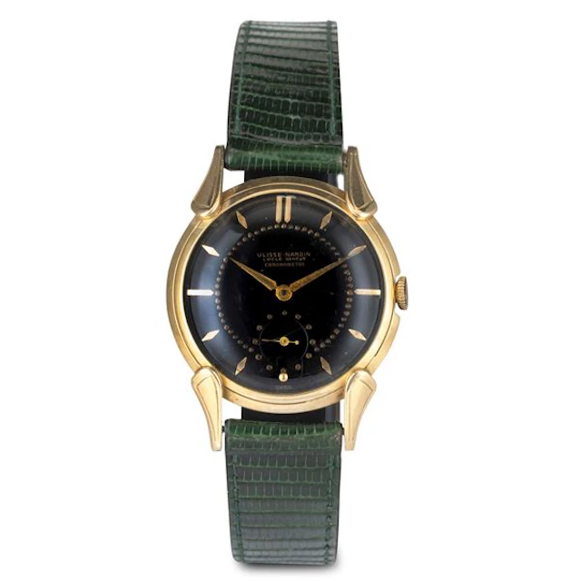 Dress Watch in oro giallo 14k con anse Cornes de Vache, quadrante