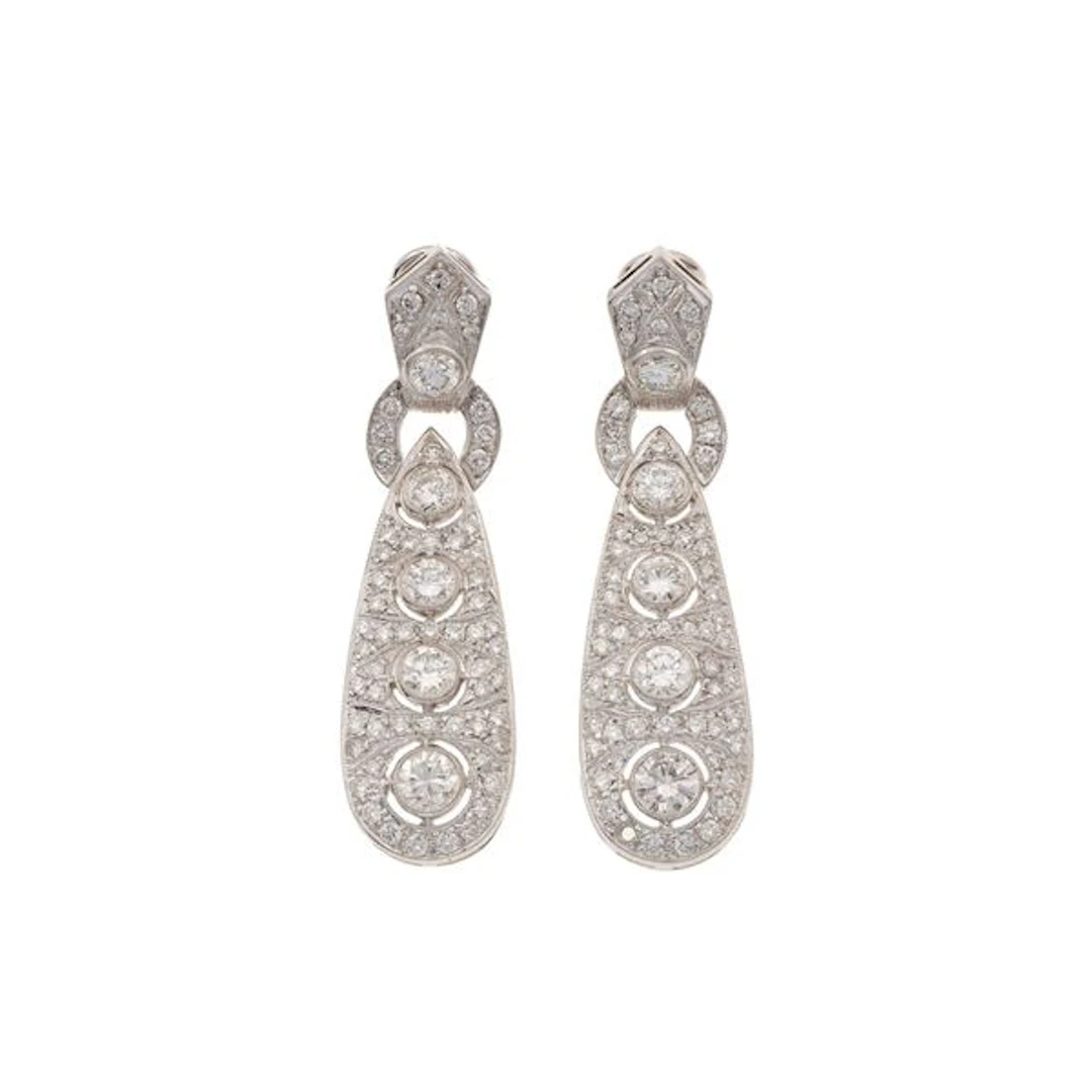 Pair of brilliant-cut diamond and gold earrings. One missing diamond