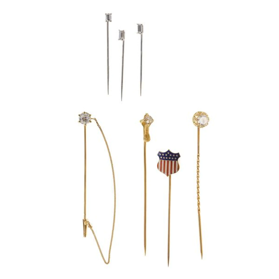 Seven diamond, enamel, gold and low-karat gold tie pins