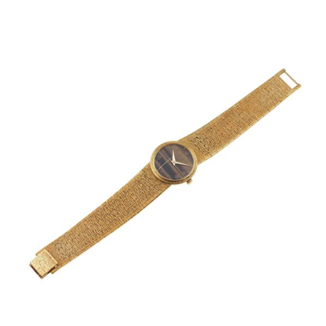 Lady's gold and tyger's eye wristwatch. Signed Piaget, numbered 924