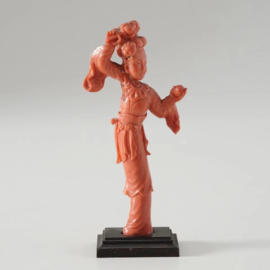 Small coral lady figure