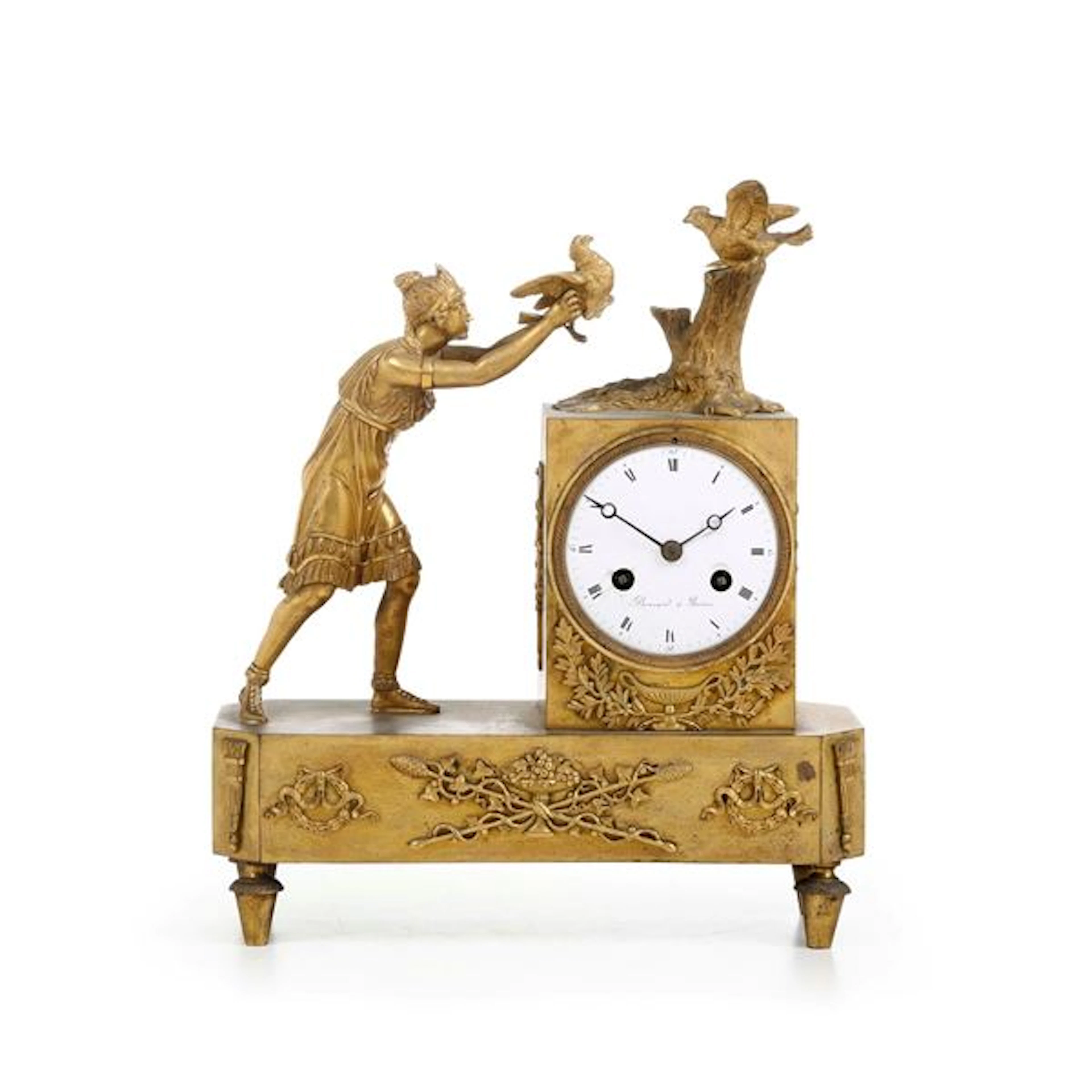 Pendola da tavolo in bronzo dorato con figura femminile e volatile.