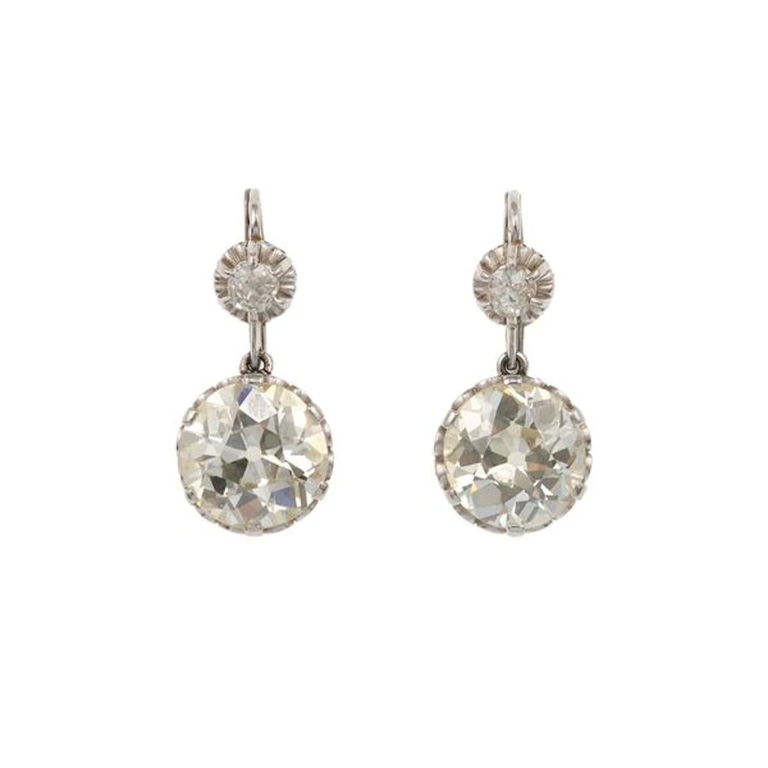 Pair of two old-cut diamond weighings 4.72 and 4.79 carats approximately