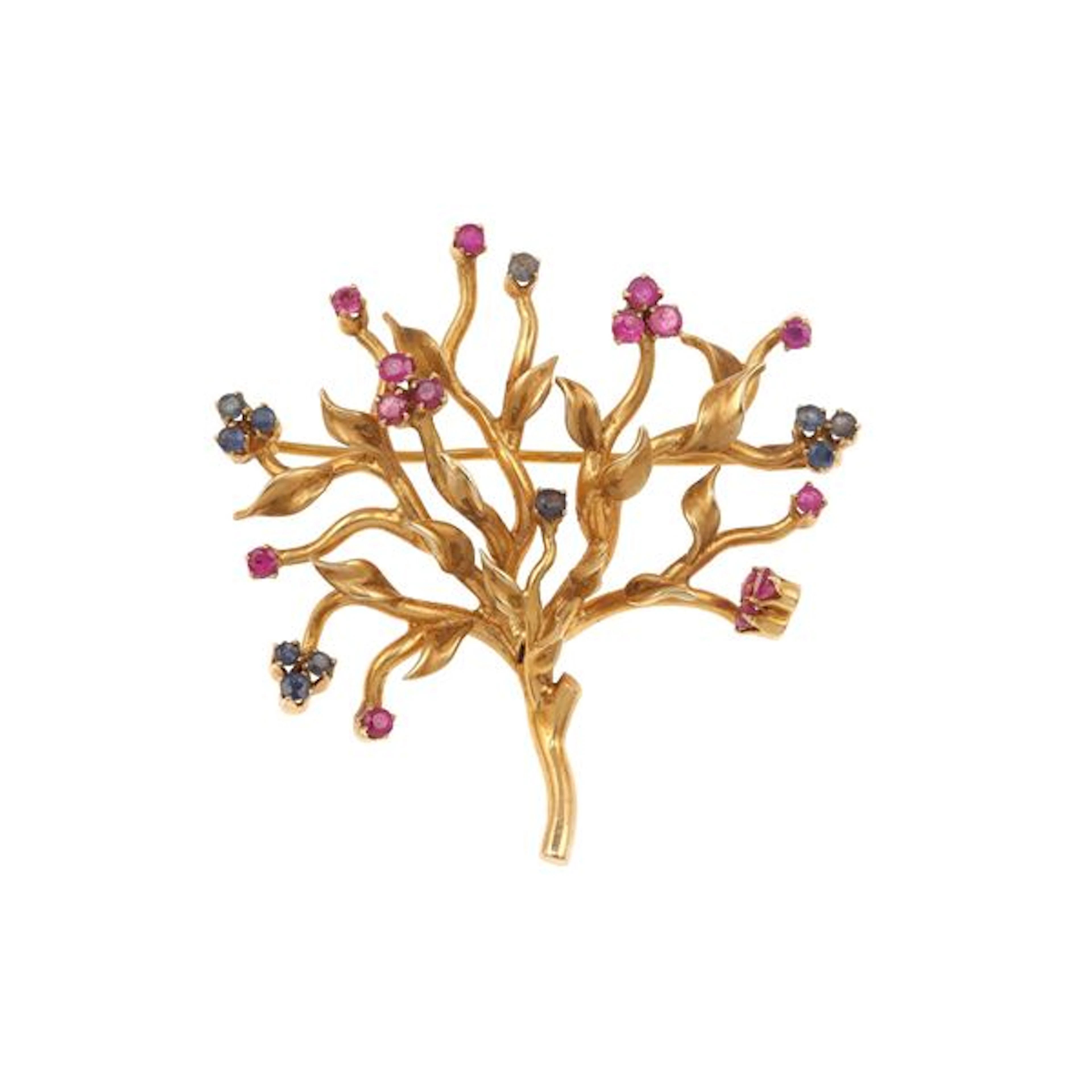 Ruby, sapphire and gold brooch. Damages
