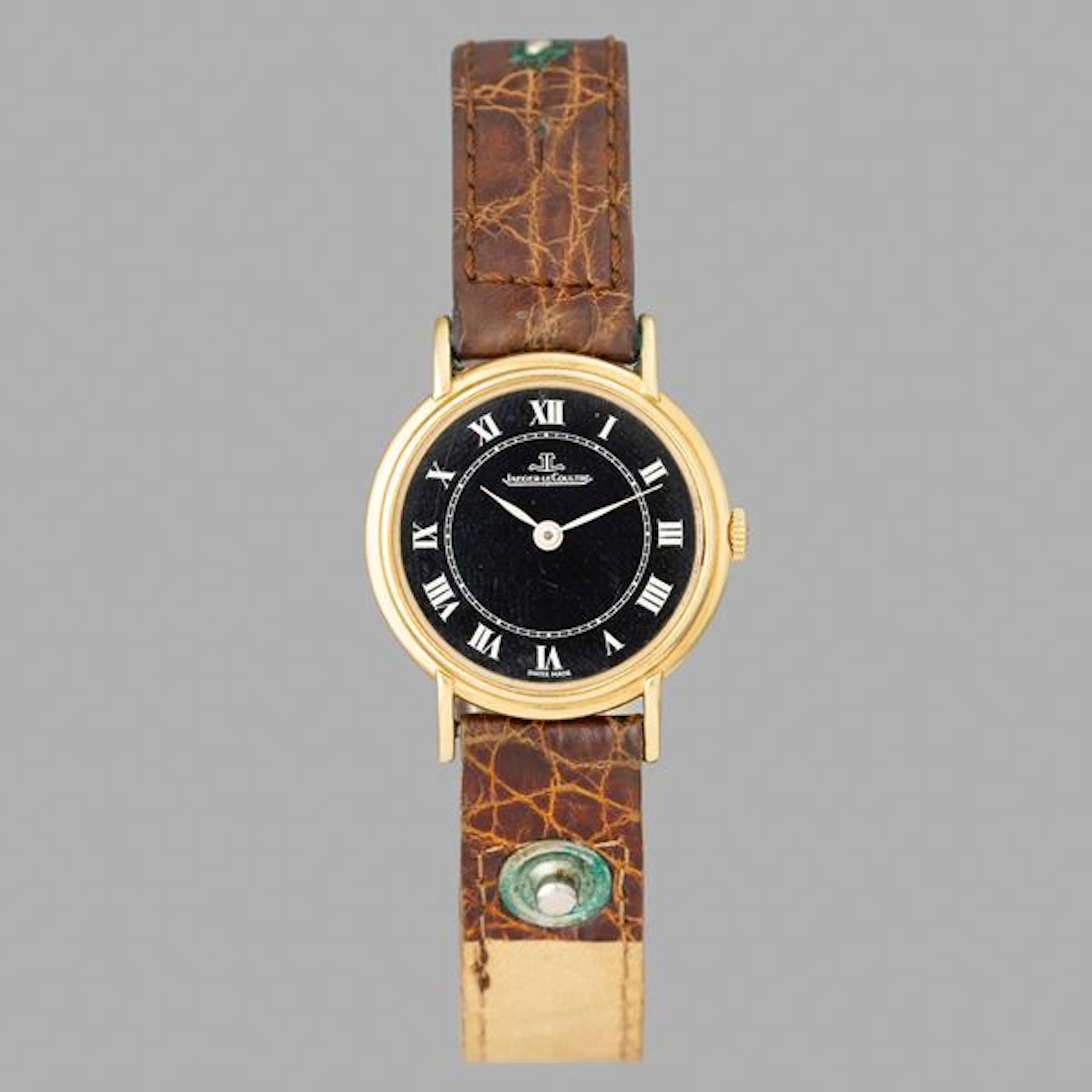 Extrapiatto ref. 9130 in oro giallo 18k, quadrante nero con numeri