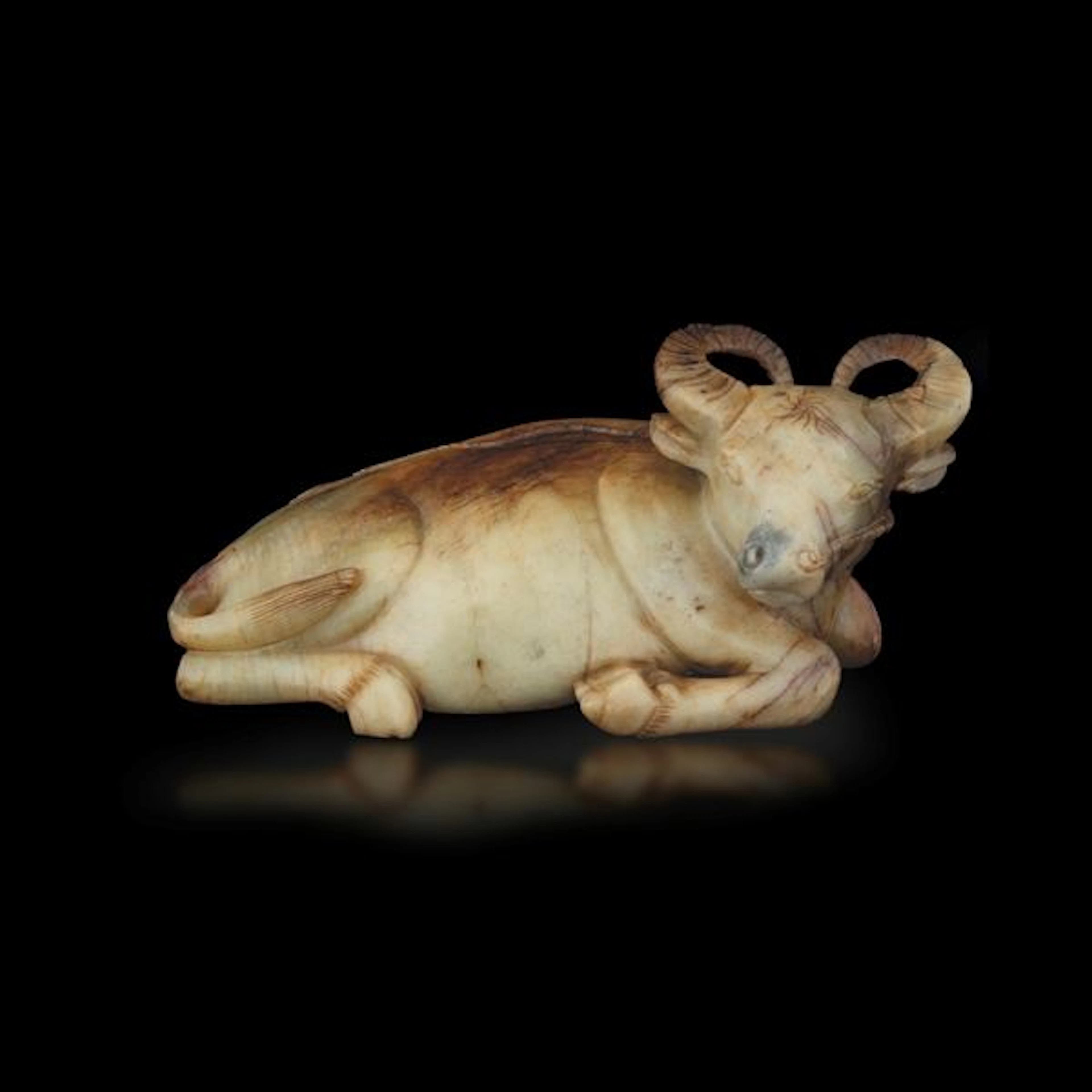 Large buffalo figure in white jade and russet, China, Qing Dynasty