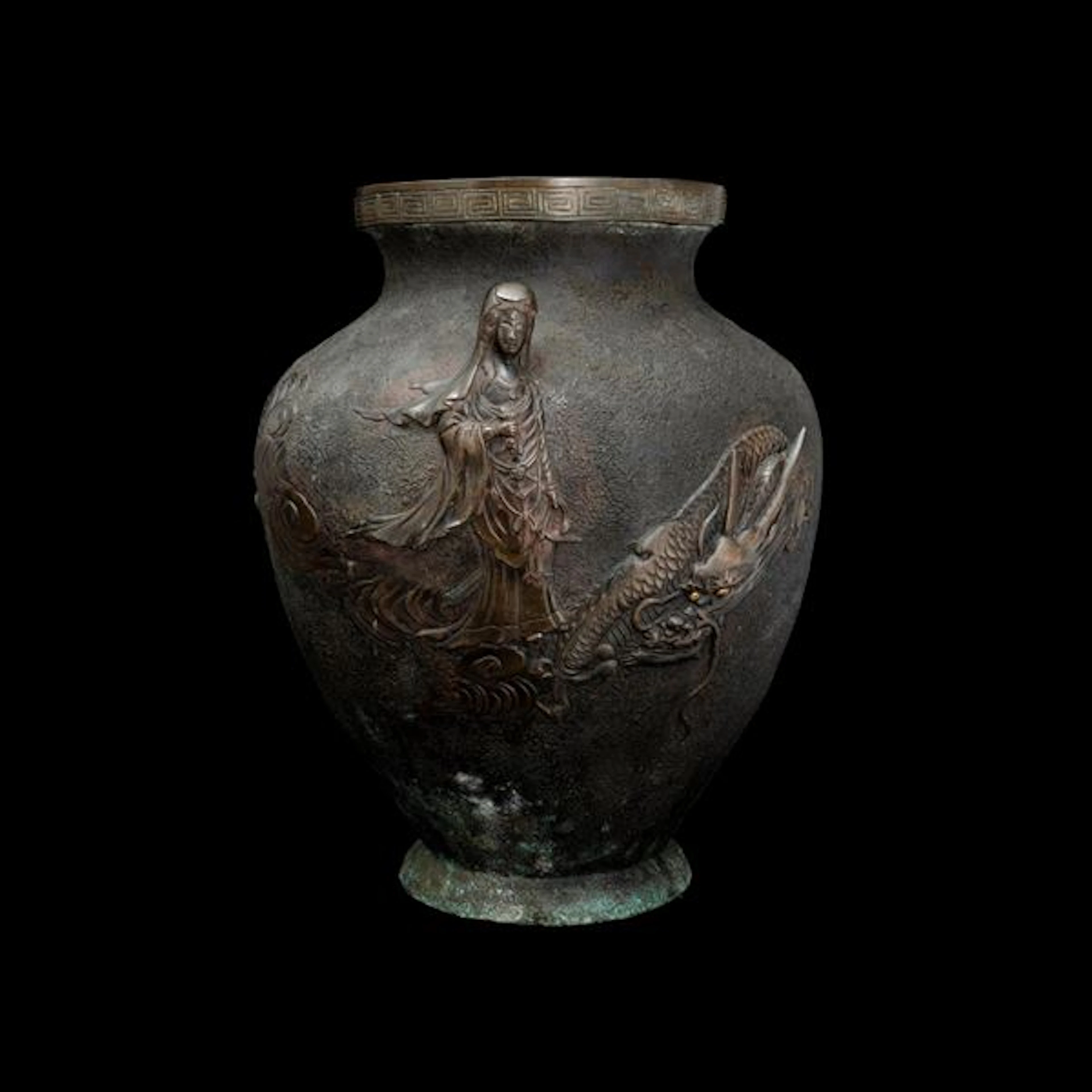Bronze vase depicting Guanyin and dragon in relief with geometric