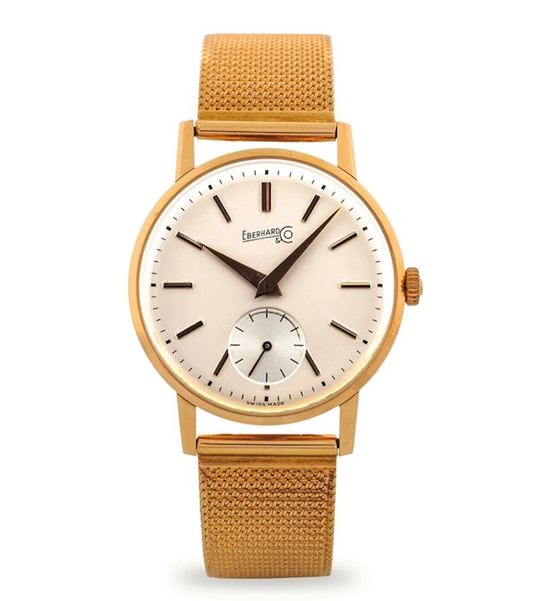 Elegant 18k yellow gold time only, opaline silver dial with seconds