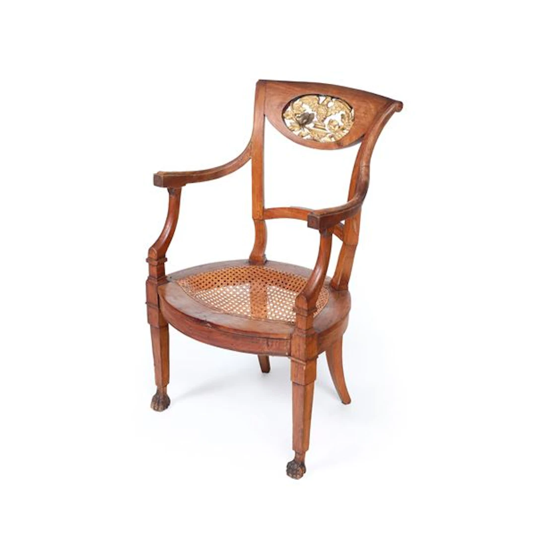 Poltrona in legno e cannetè. XIX secolo