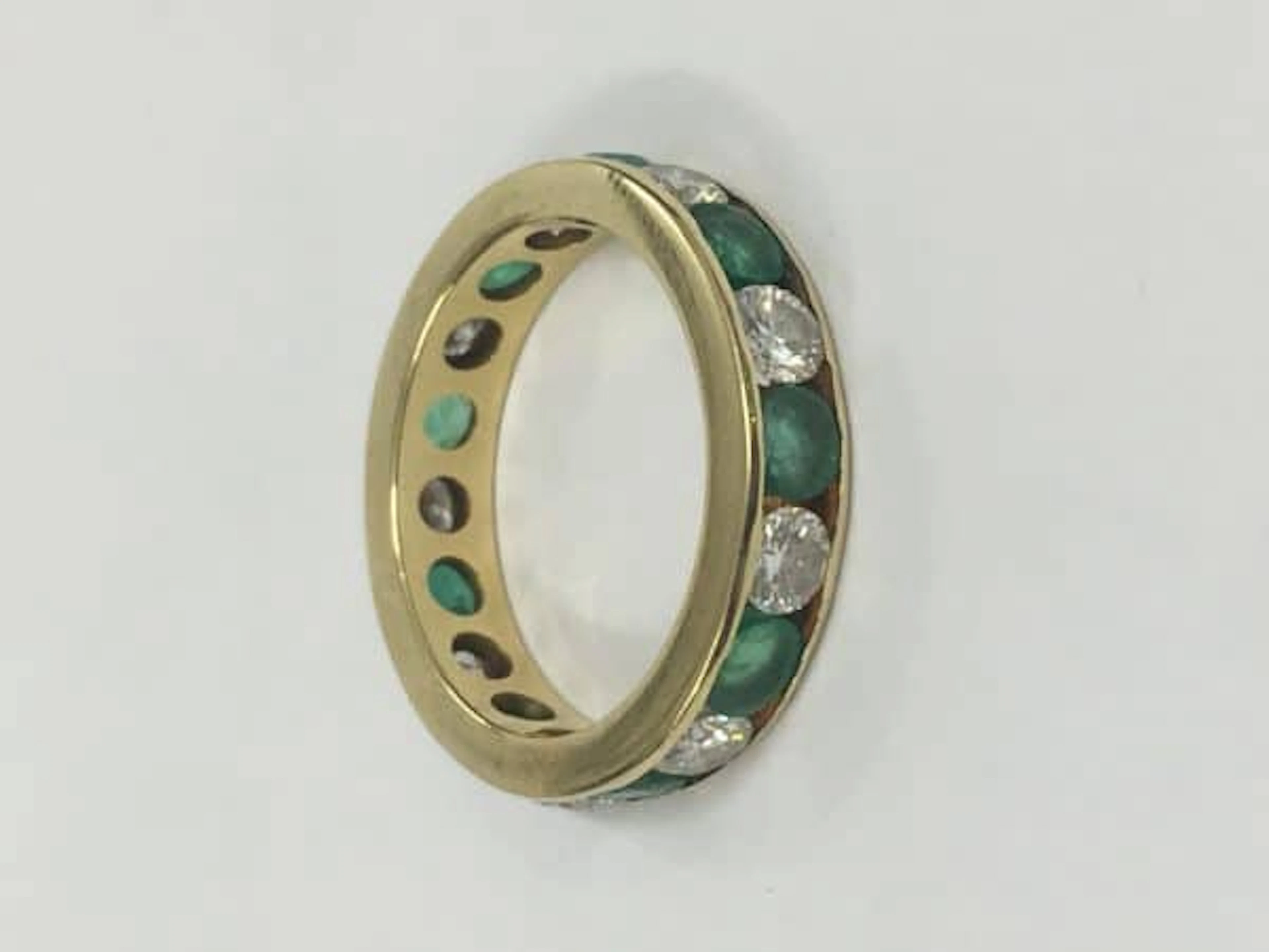EMERALD AND DIAMOND ETERNINTY RING CHANNEL SET 18CT GOLD