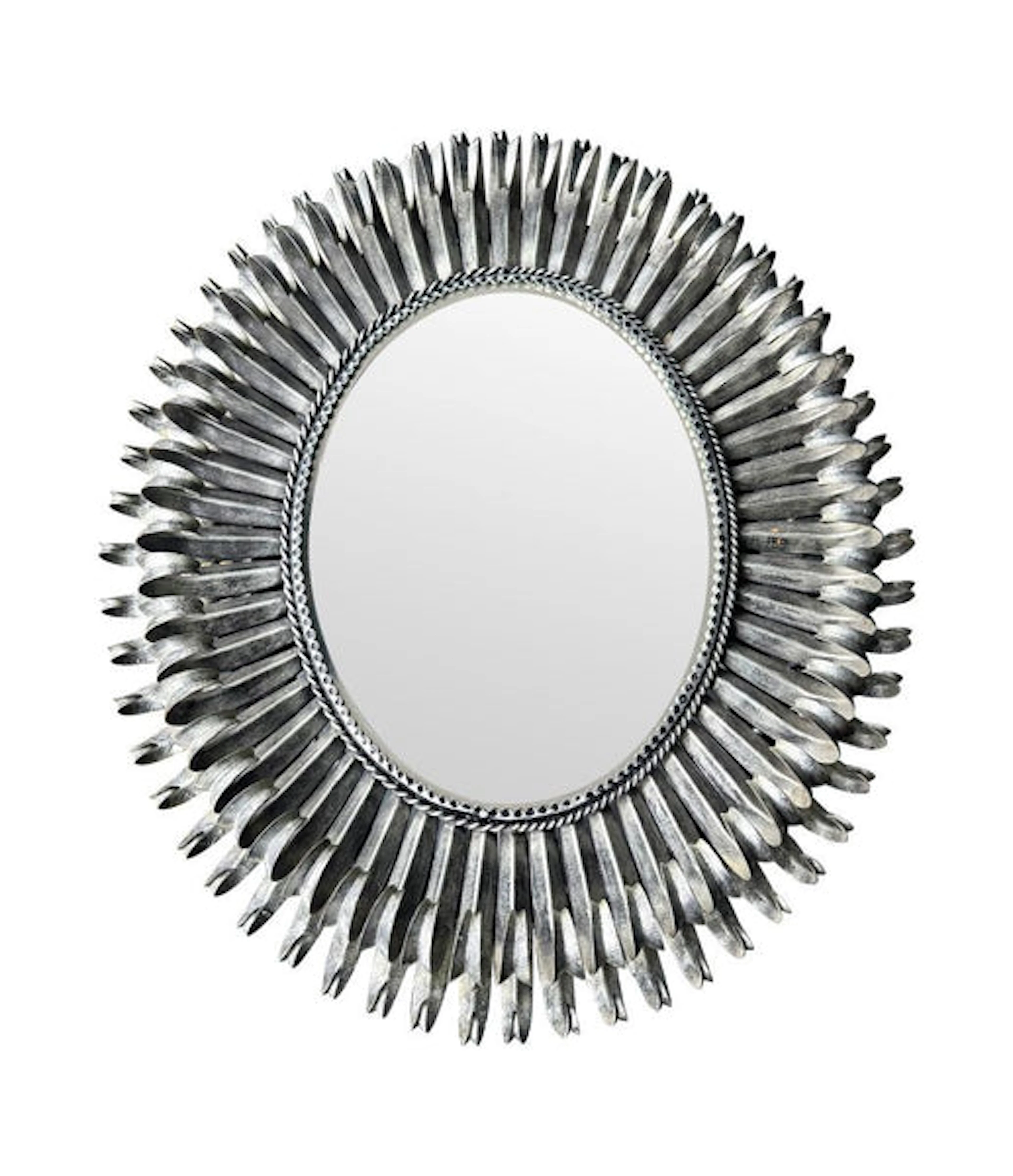 A Spanish 1960s silvered metal landscape or portrait oval eyelash mirror
