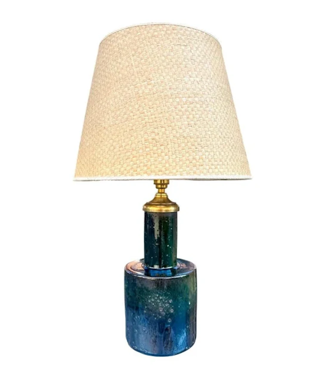 A lovely Italian 1970s green ceramic and brass lamp with orignal rattan shade
