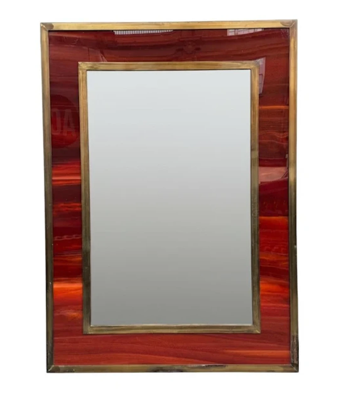 An Italian 1970s Faux tortoiseshell and brass landscape or portrait mirror