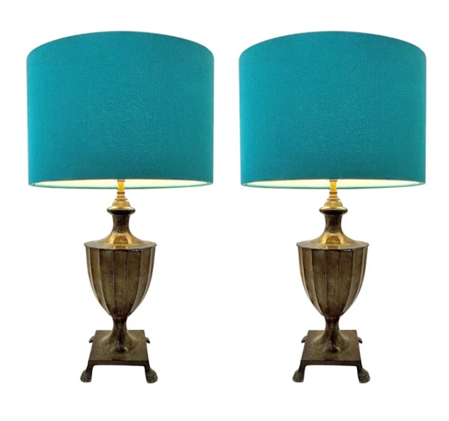 A pair of 1970s classical cast bronze lamps with verdigris finish and paw feet