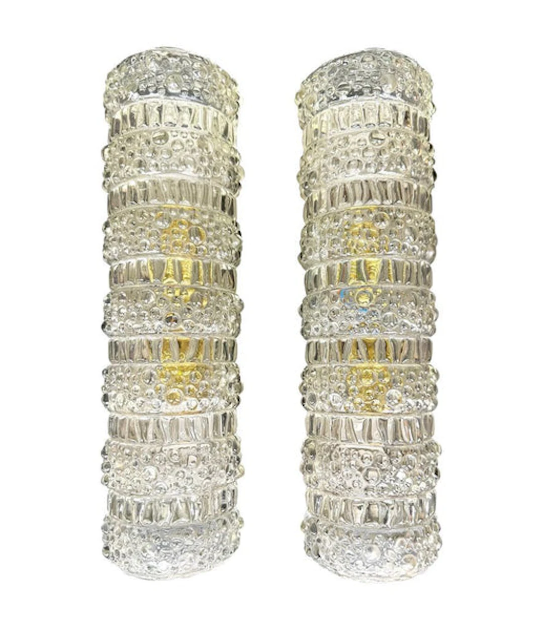 A pair of 1960s clear geometric textured glass wall lights
