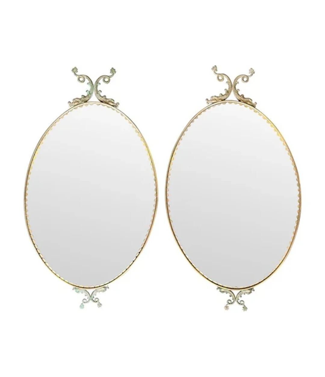 A pair of Italian 1940s oval mirrors with dolphin detailing around