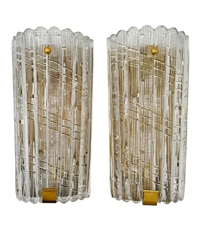 A large pair of Swedish 1960s Orrefors glass and brass wall sconces
