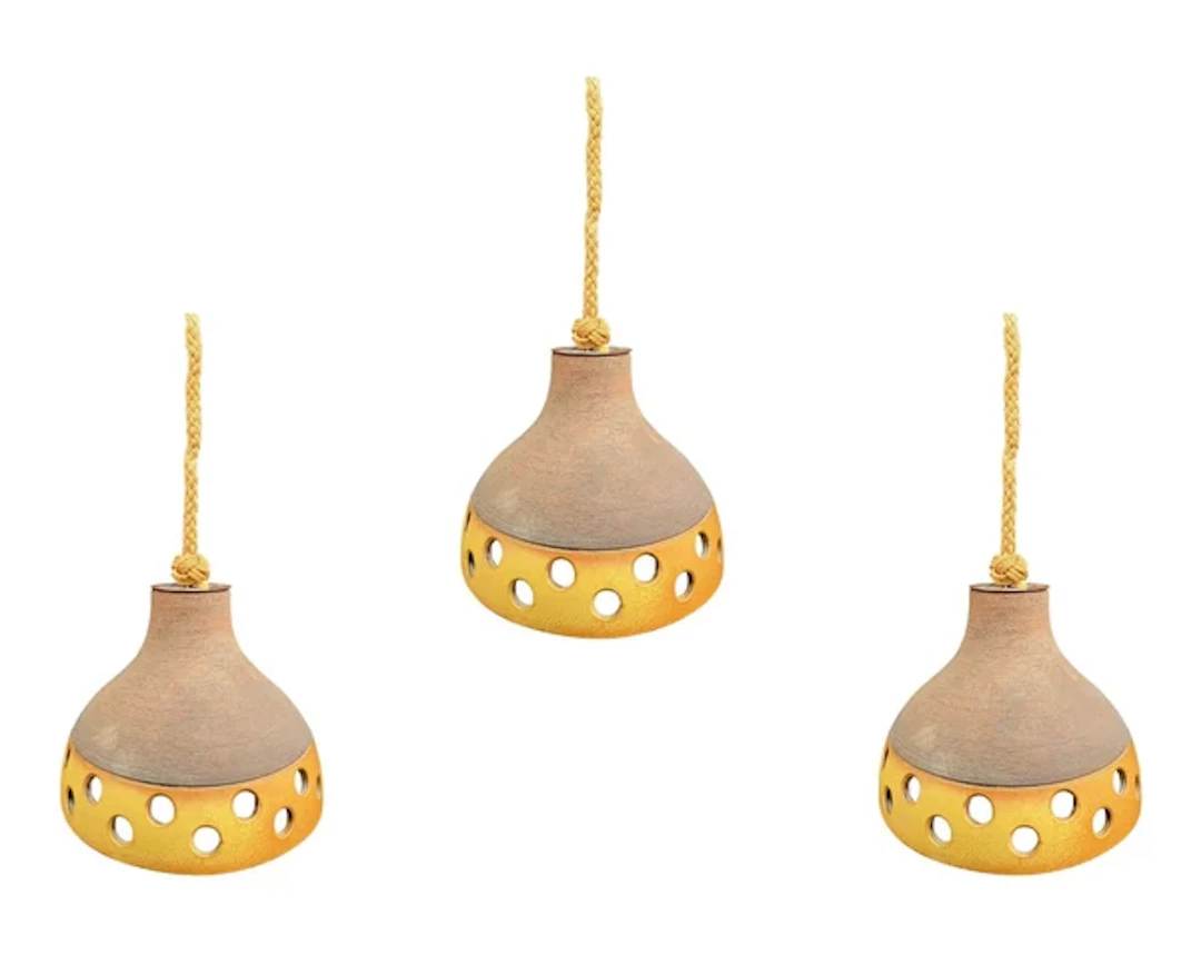 A set of three 1960s French glazed ceramic ceiling lights suspended