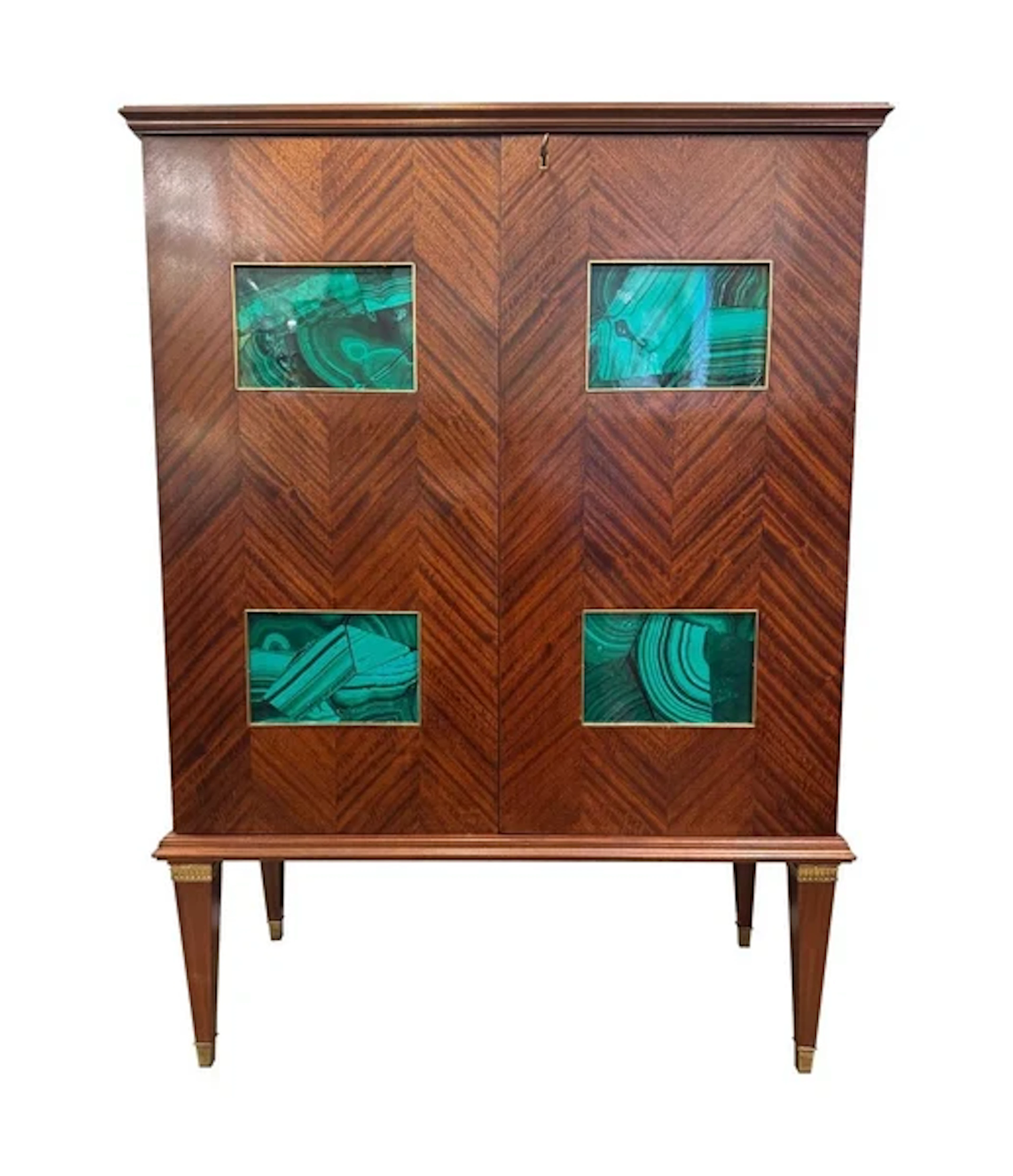 A wonderful 1950s two door bar cabinet by Paolo Buffa with faux malachite