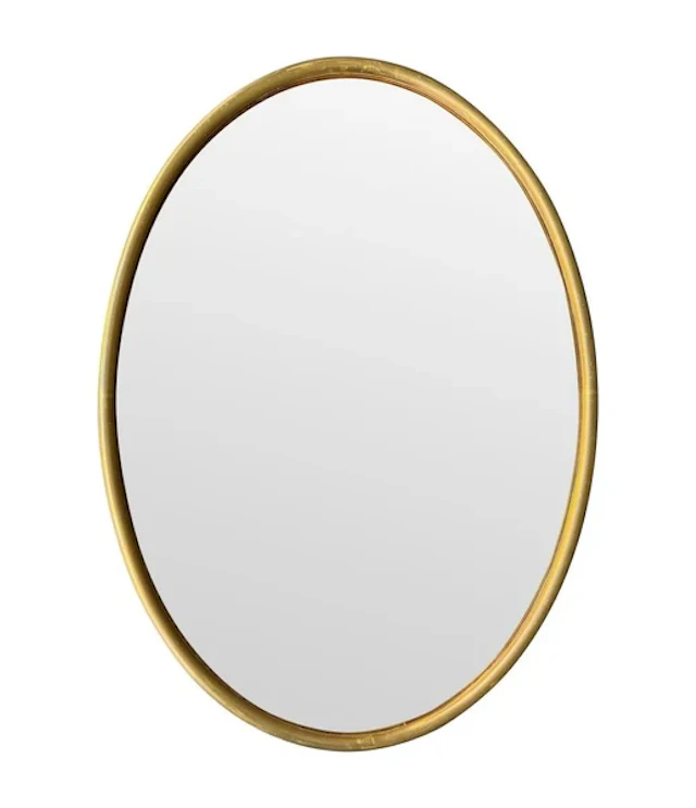 A large 1970s Italian brass framed oval mirror with bronzed mirror plate