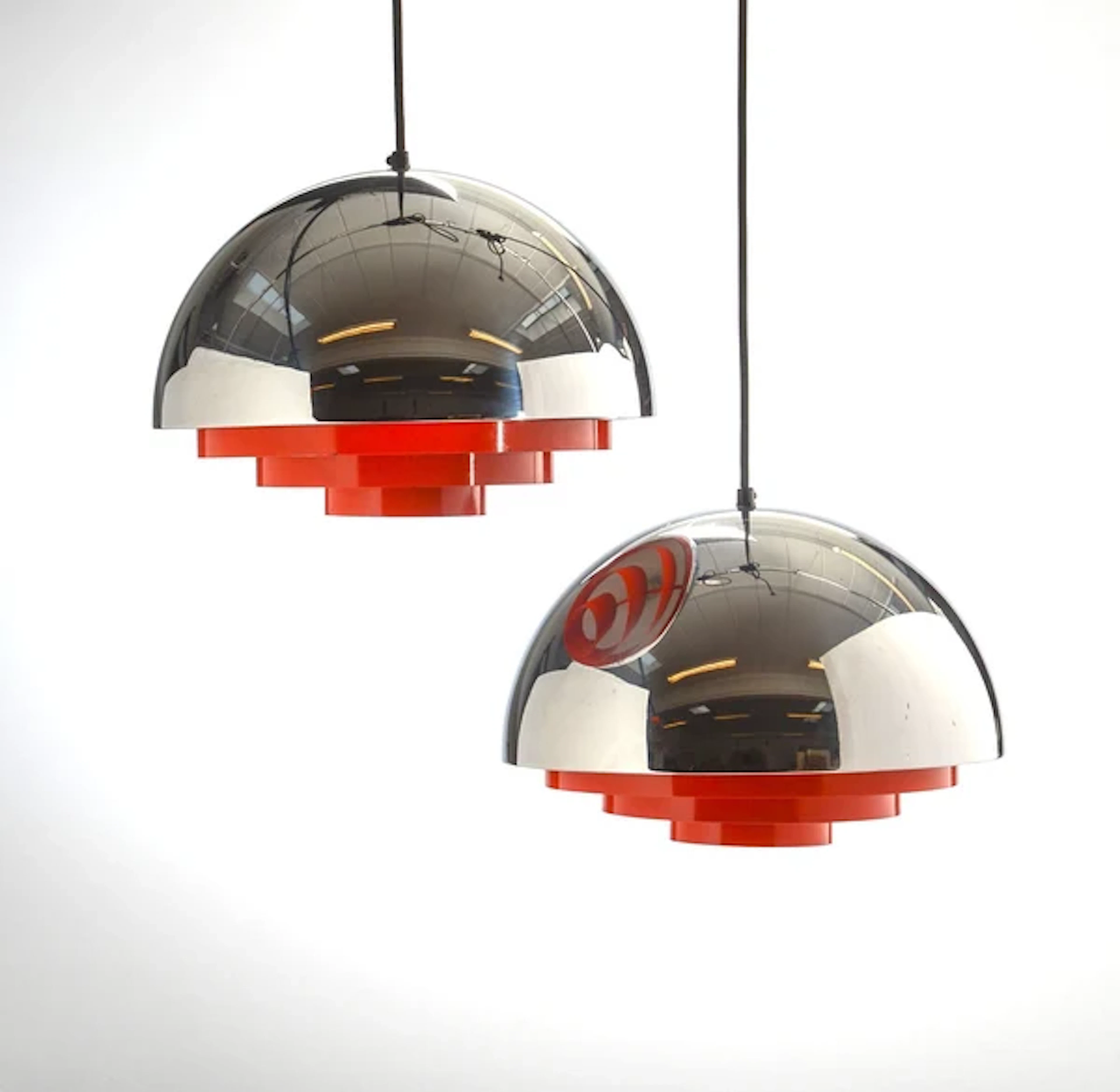 A pair of original polished chrome and orange steel "Milieu" ceiling