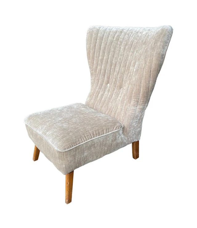 An Italian 1950s cocktail slipper chair upholstered in mushroom velvet.