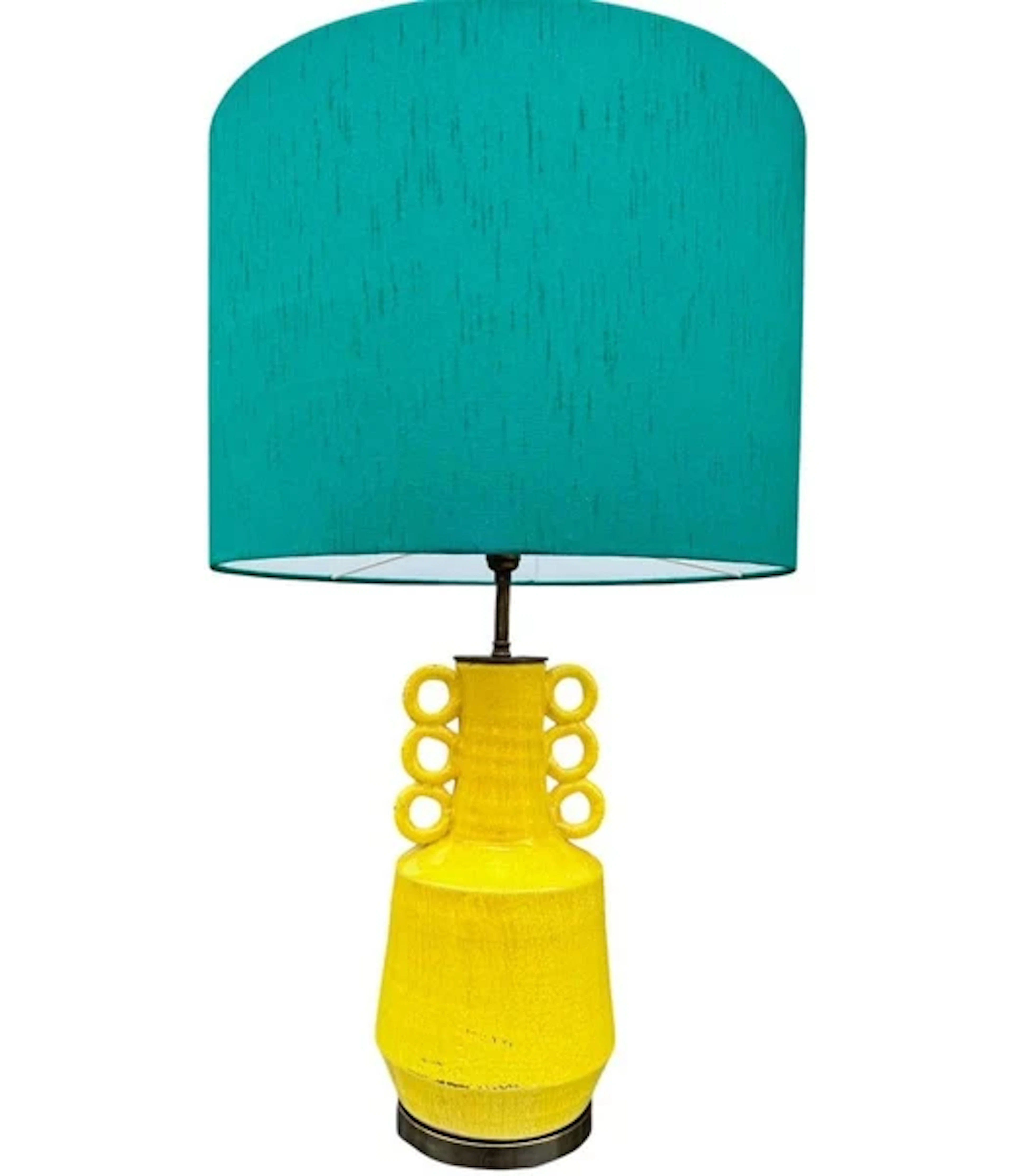 A mid century style yellow ceramic and bronze lamp with six handle design.