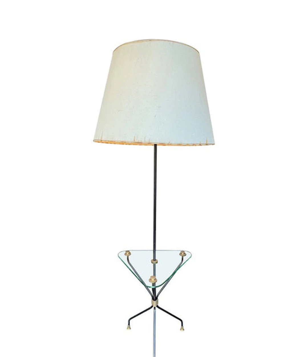 A 1950s French black lacquer and brass tripod floor lamp with glass