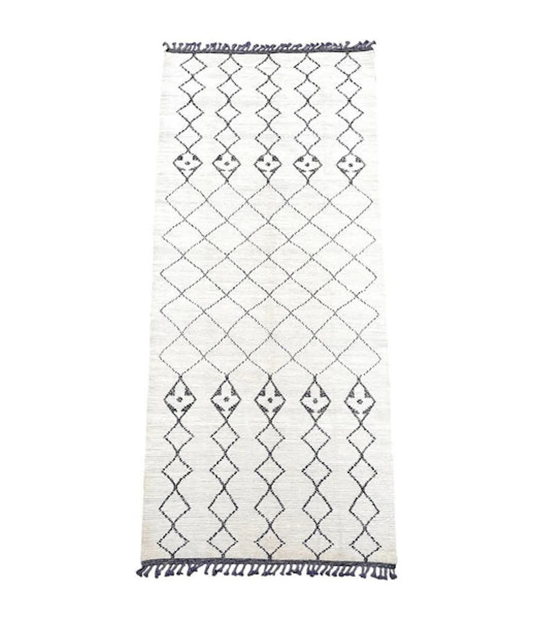 A large handwoven Moroccan Beni Ourain wool berber rug with tribal