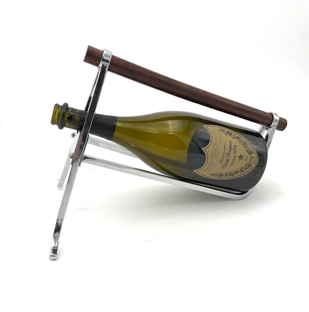 A 1950s Jacques Adnet chrome and rosewood bottle holders for Christolfe