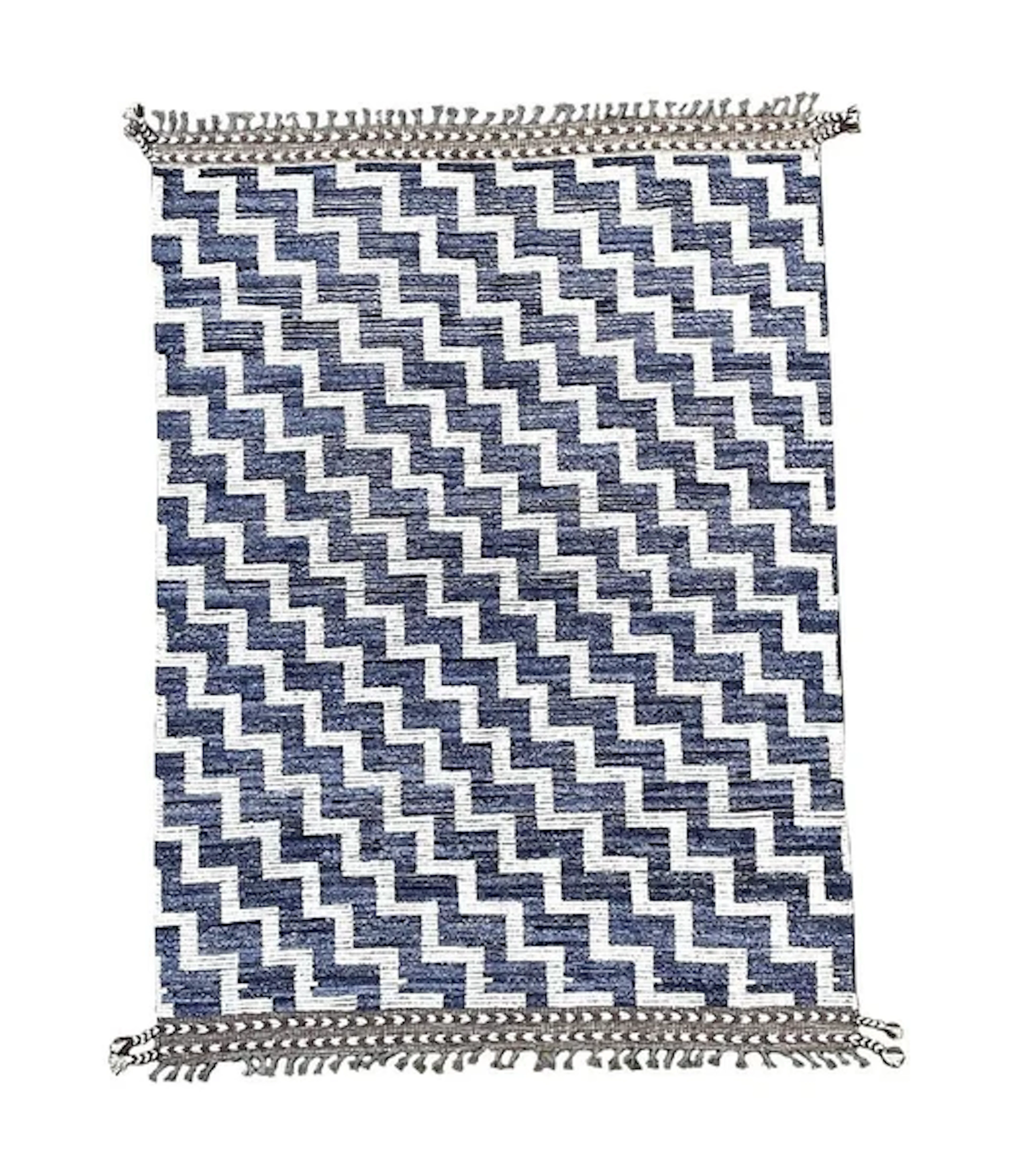 A handmade Morrocan Beni Ourain Berber rug with blue and white stepped design.