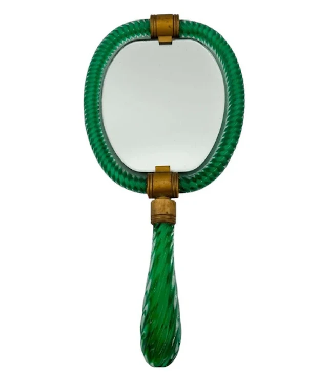 A 1940s Art Deco Italian green "Torchon" Murano glass hand mirror
