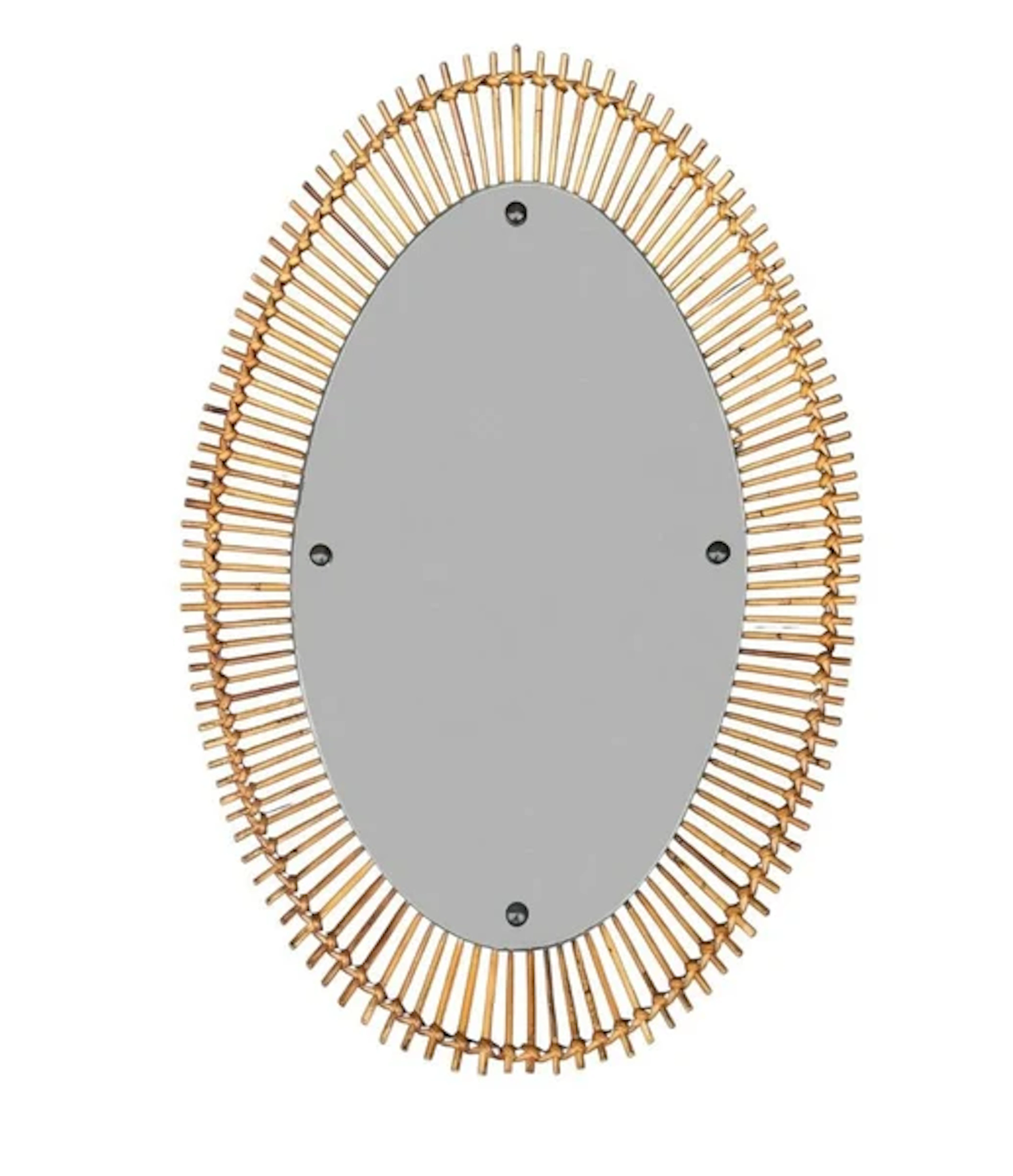 A large 1960s Bonacina Italian oval pencil reed bamboo mirror with brass detail