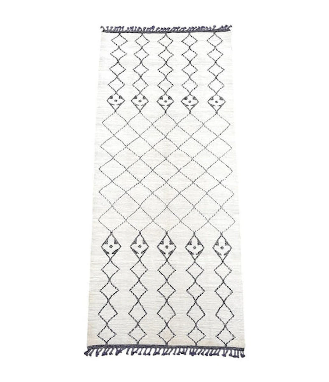 A large handwoven Moroccan Beni Ourain wool berber rug with tribal