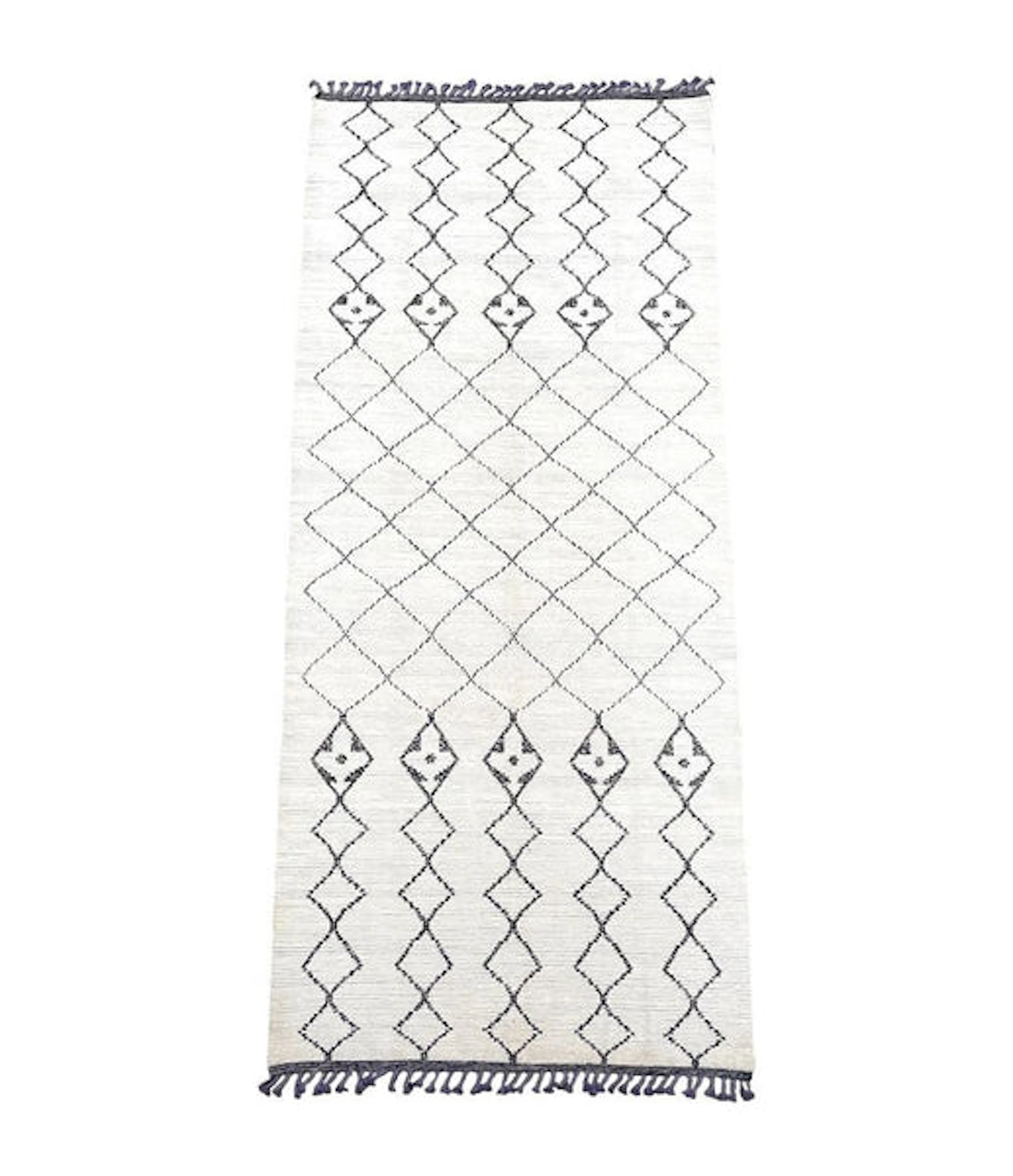 A large handwoven Moroccan Beni Ourain wool berber rug with tribal