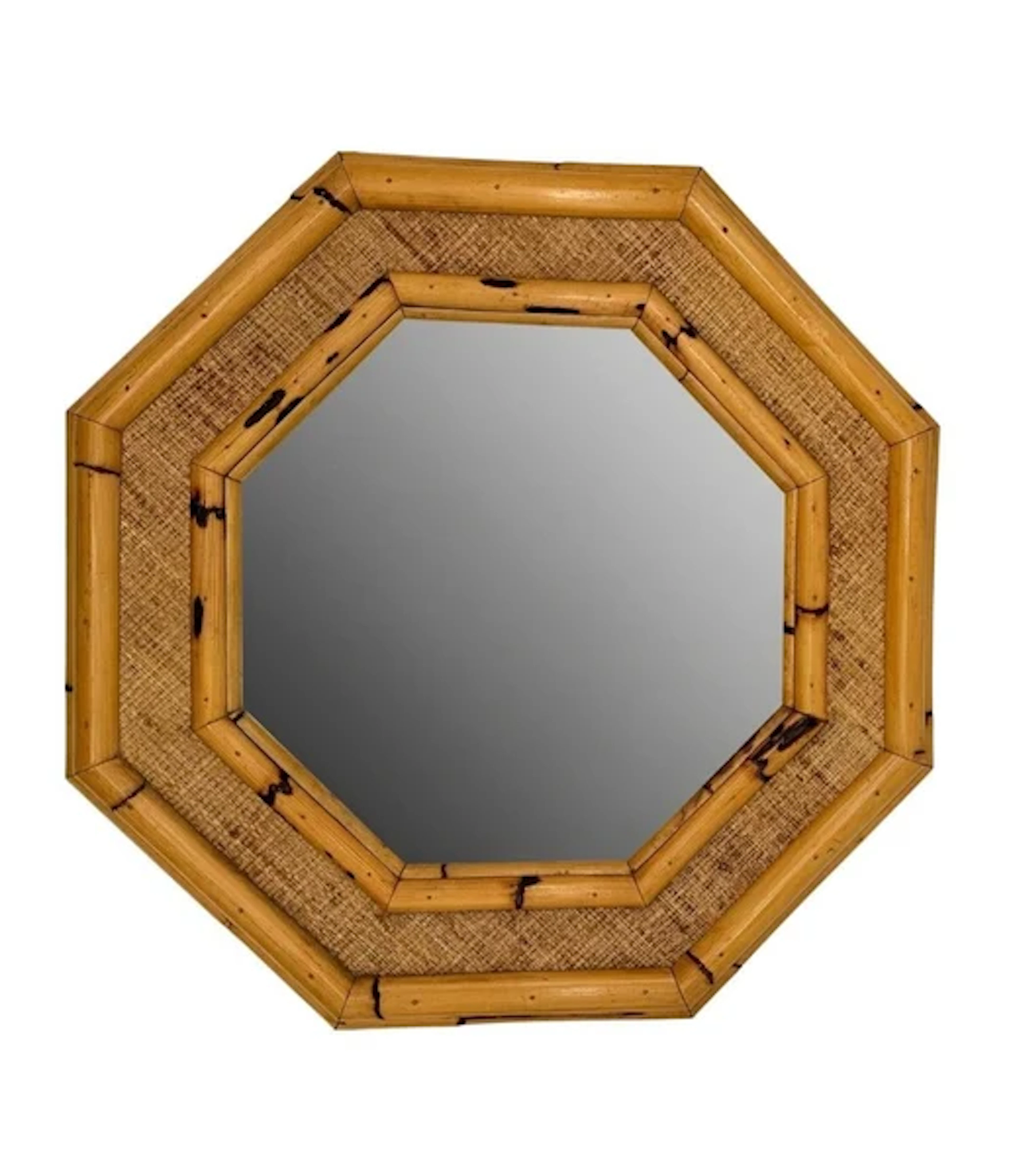 A 1970s Italian octagonal bamboo mirror with chunky bamboo frame with