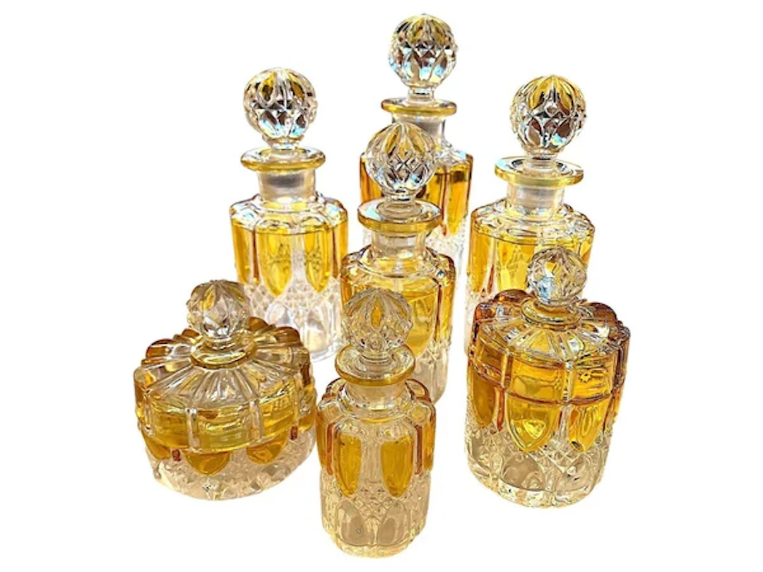 A. collection of seven Val Sat Lambert 1920s perfume bottles.