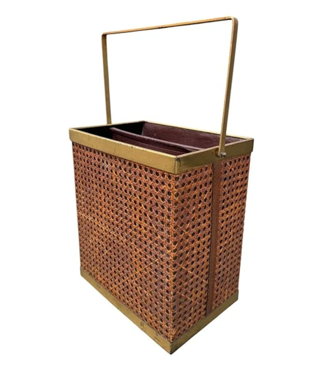 An Italian 1970s rattan and gilt metal magazine rack