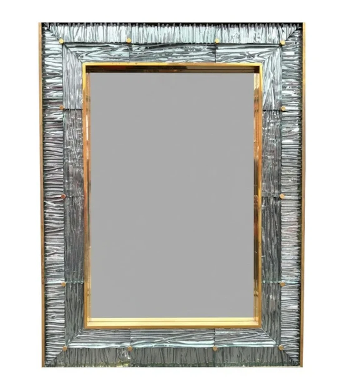 A large orignal Italian 1970s solid brass mirror with blue Murano glass frame