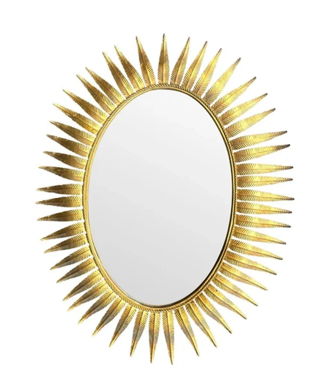 A wonderful 1950s gilt metal oval Spanish sunburst, eyelash mirror