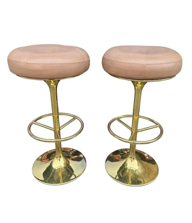 A pair of Italian 1970s gilt metal and leather bar stools