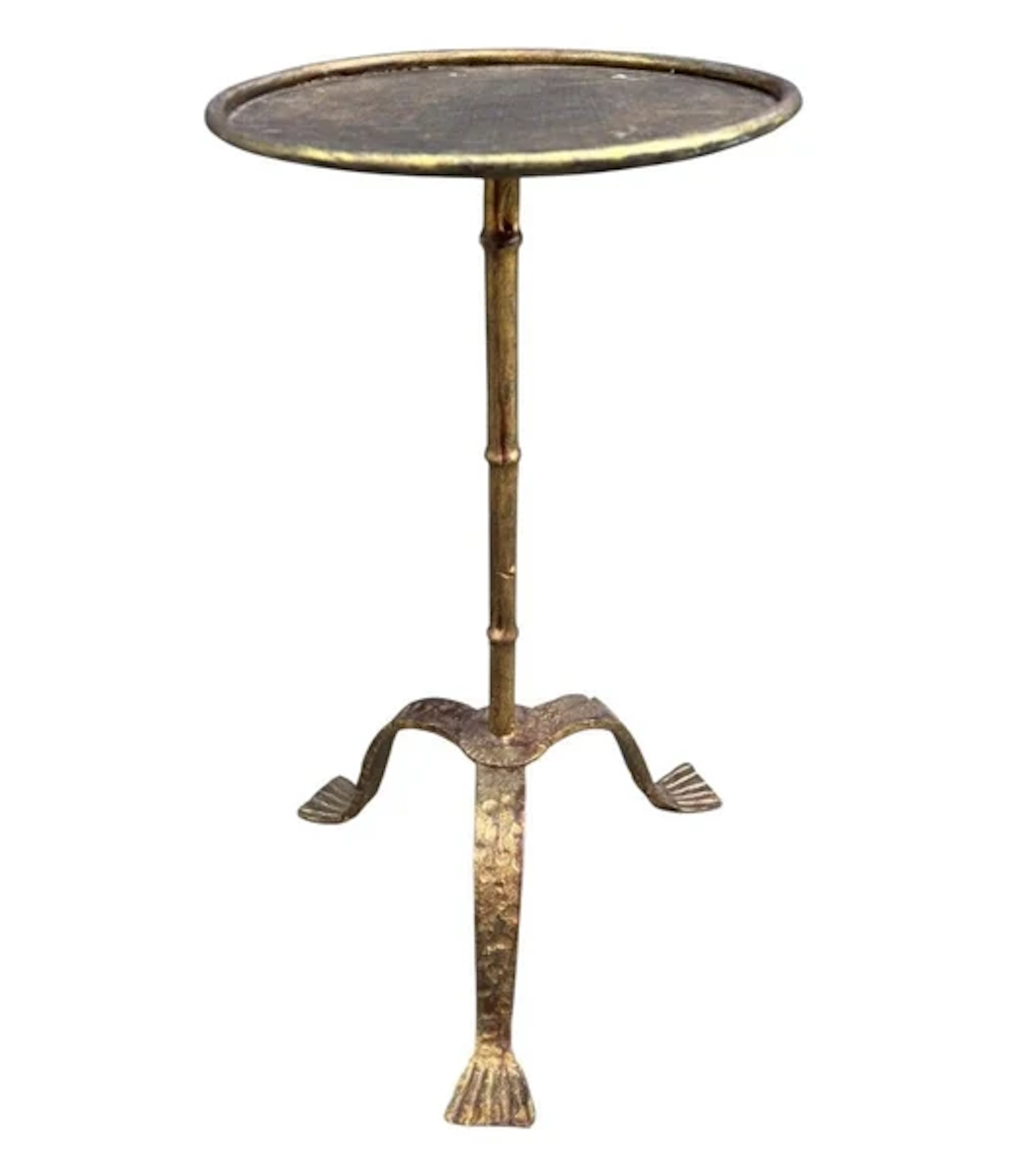 A Spanish 1950s gilt wrought iron martini table with three shaped legs